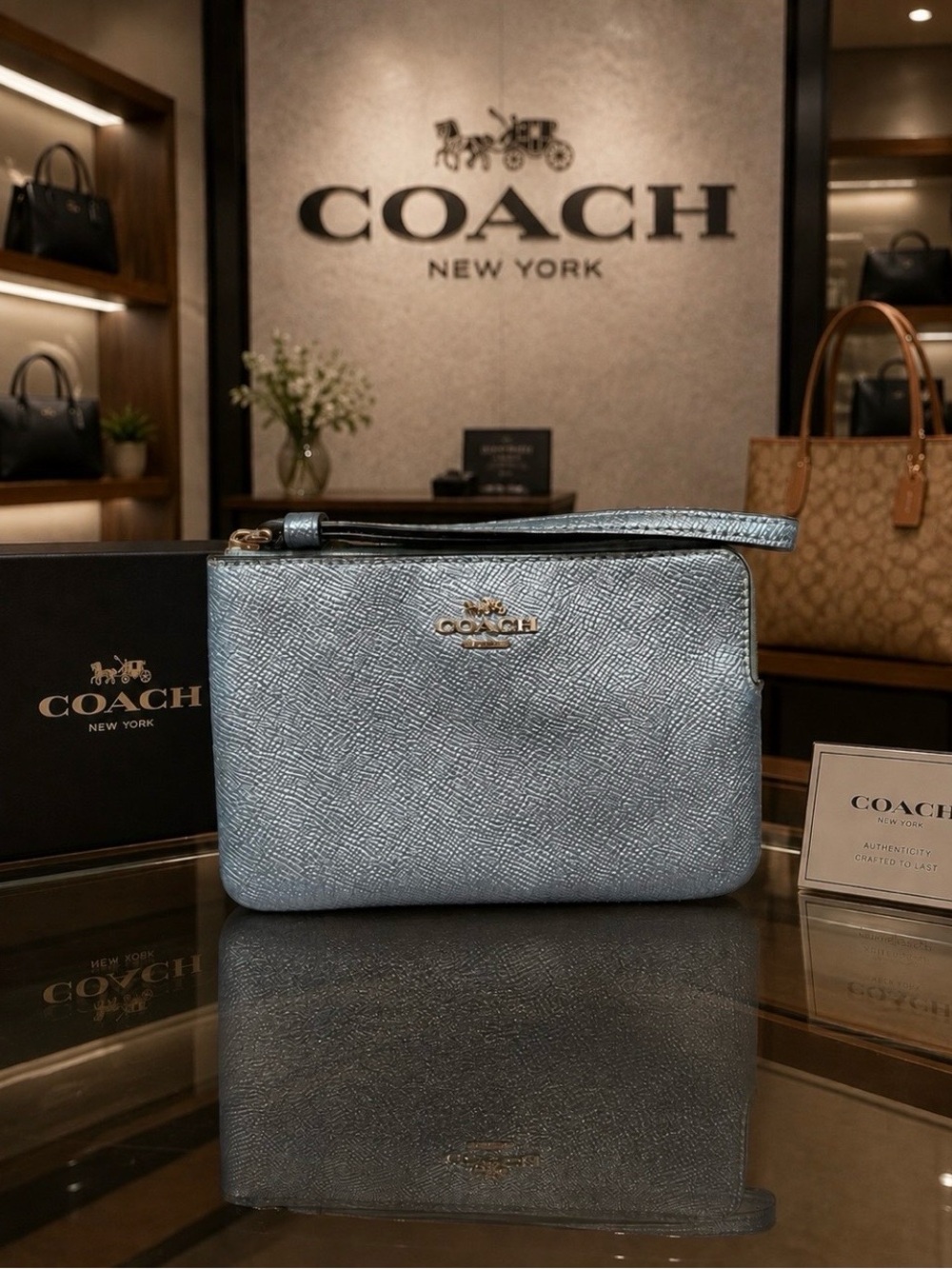 Authentic Coach Metallic Light Blue Leather Wristlet with Gold Logo
